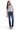 SaltTree model wearing Mica Denim dark indigo mid-rise bootcut jeans with whiskering and a grey t-shirt