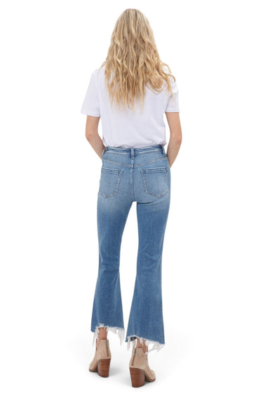 SaltTree Mica Denim high rise crop flare jeans in vintage medium blue with a frayed shark bite hem, back view