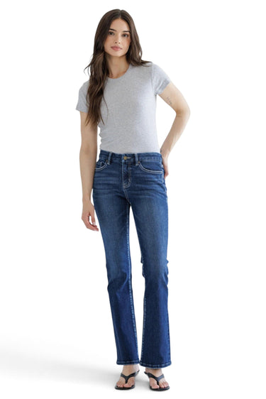 SaltTree Mica Denim dark indigo mid-rise bootcut jeans with whiskering worn by a model in a grey t-shirt