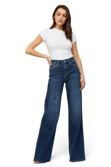 Model wearing SaltTree mica denim dark indigo super high rise wide leg skater jeans with a 34 inch inseam