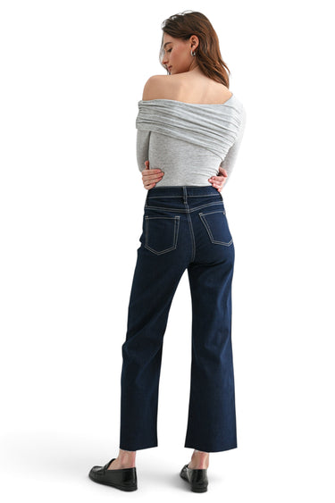 SaltTree Mica Denim high-rise wide-leg jeans in dark indigo glitter fabric with raw-cut hem worn by a model