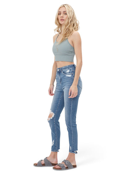 SaltTree Mica Denim high rise crop skinny jeans in vintage medium blue with ripped knee and raw hem on a model
