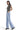 Model wearing SaltTree Mica Denim super high rise light blue loose straight jeans with whiskering and finished hems.