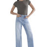 Model wearing SaltTree Mica Denim super high rise loose straight jeans in light blue wash with a grey t-shirt.