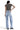 SaltTree Mica Denim light blue super high rise loose straight jeans worn by a model with a grey t-shirt and heels