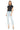 Model wearing SaltTree Mica Denim super high rise light wash skinny jeans with a raw hem and black t-shirt