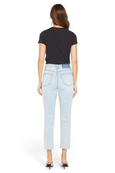 SaltTree Mica Denim light wash super high rise skinny jeans with a raw hem, viewed from the back on a model.