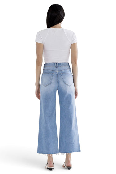 SaltTree Mica Denim light wash super high rise wide leg cropped jeans viewed from the back on a model