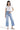 SaltTree model wearing Mica Denim light wash super high rise wide leg cropped jeans with a white ribbed top.