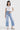 SaltTree Mica Denim light wash super high rise wide leg cropped jeans with front patch pockets on a model