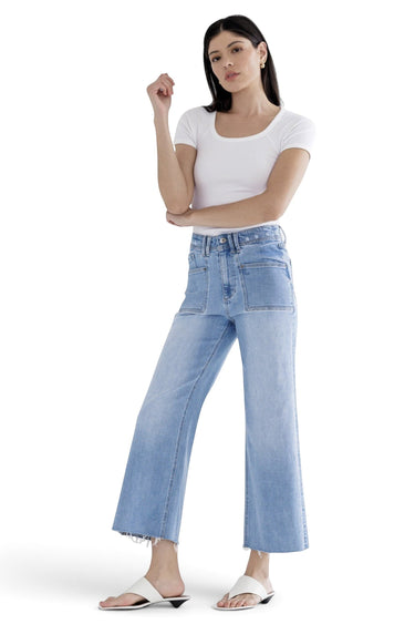 SaltTree model wearing Mica Denim light wash super high rise cropped wide leg jeans with a white t-shirt