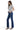 Model wearing SaltTree Mica Denim mid-rise dark indigo bootcut jeans with whiskering and a grey t-shirt