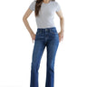 SaltTree Mica Denim mid-rise bootcut jeans in dark indigo with whiskering worn by a model with a grey t-shirt