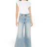 SaltTree model wearing Mica Denim high rise super wide palazzo crop jeans in a medium wash with a white t-shirt