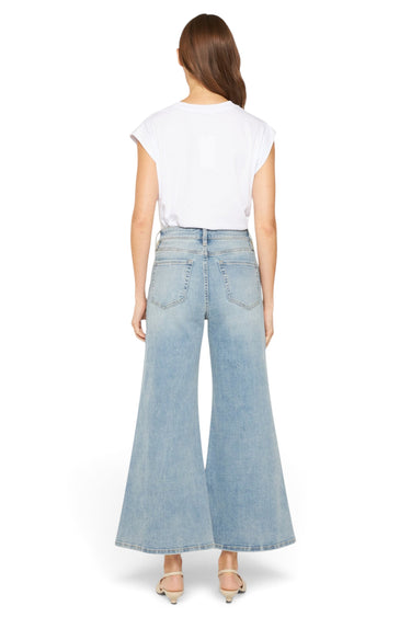 SaltTree Mica Denim high rise palazzo crop jeans in medium wash with wide leg fit, back view on model