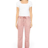SaltTree model wearing Mica Denim pink high rise jogger cropped pants with cuffed ankles and drawstring waist.
