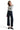 SaltTree model wearing Mica Denim dark indigo high-rise wide-leg ankle jeans with shimmer finish and raw-cut hem.