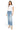 SaltTree model wearing Mica Denim high-rise straight leg jeans in medium-light wash with a folded hem and white tee