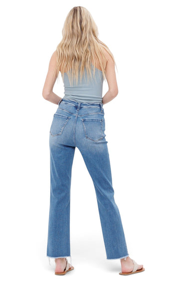 SaltTree Mica Denim Aniello super high rise straight leg jeans in medium blue with a raw fringe hem, back view.