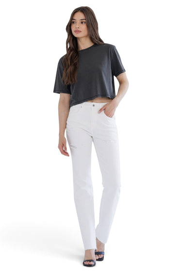 Model wearing SaltTree Mica Denim white high rise slim straight tummy tuck jeans with a cropped charcoal t-shirt.