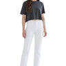 Model wearing SaltTree Mica Denim high rise white slim straight jeans with tummy tuck waistband and cropped black tee.