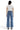 SaltTree Mica Denim high rise wide leg jeans in medium blue with a distressed raw hem seen from the back