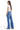 SaltTree model wearing Mica Denim high-rise wide-leg jeans in medium indigo blue with a classic five-pocket design