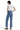 SaltTree Mica Denim high-rise wide-leg jeans in medium blue with a distressed raw hem, worn by a model from behind.