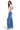 SaltTree Mica Denim high-rise wide-leg jeans in medium indigo blue with whiskering, worn by a model in a white top.