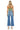 SaltTree Mica Denim super high rise wide leg jeans in vintage medium blue with a frayed raw hem, back view.