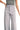 SaltTree Miou Muse high rise wide leg crop pants in light grey stretch twill with a button fly and raw hem detail.