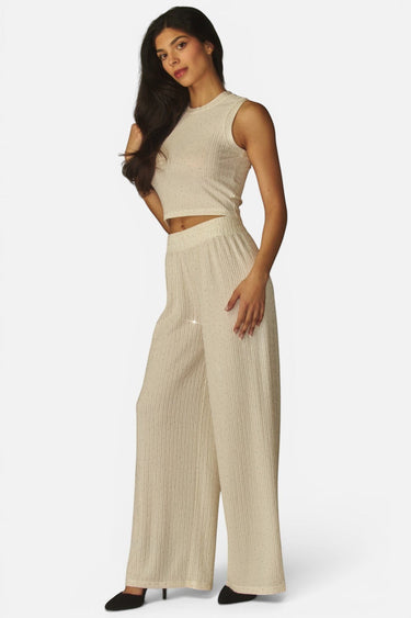 SaltTree Love Poem off white crinkled plisse crop top and wide-leg pant set with rhinestone embellishments on a model