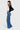 SaltTree ONE HUNDRED B high rise relaxed wide leg jeans in medium stone wash denim on a model in profile view