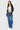 SaltTree model wearing ONE HUNDRED B high rise relaxed wide leg medium wash denim jeans with hand sanding details.