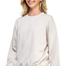 SaltTree Reflex beige relaxed fit fleece crew neck sweatshirt worn by a smiling model with blue jeans