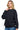Model wearing a black SaltTree Reflex fleece oversized crew neck sweatshirt with ribbed trims and long sleeves.