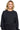 SaltTree Reflex black fleece crewneck sweatshirt with ribbed trims worn by a smiling blonde model
