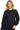 SaltTree model wearing a black Reflex fleece relaxed fit crew neck sweatshirt with ribbed trims