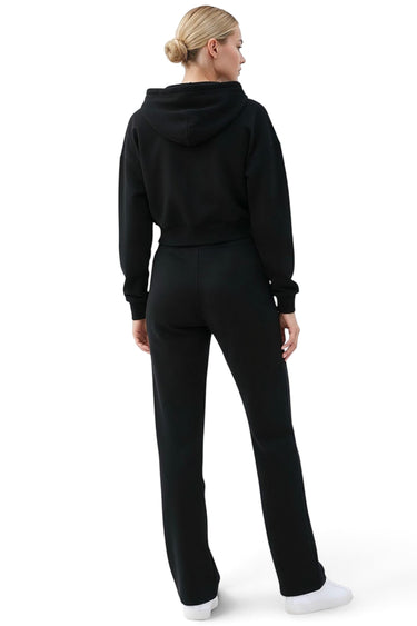 SaltTree Reflex black scuba knit cropped zip-up hoodie worn by a model from the back view.