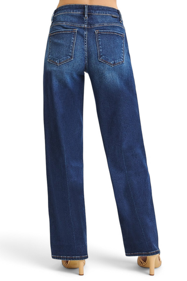 SaltTree Risen Jeans mid rise wide baggy jeans in dark indigo wash with clean stitched hem, back view.