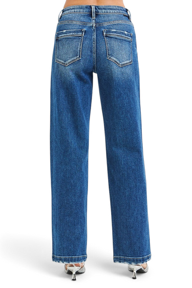 SaltTree Risen Jeans high rise slouchy baggy jeans in dark indigo wash with a released raw hem, back view.