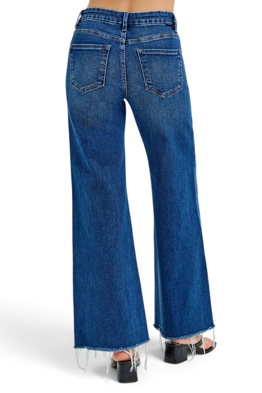 SaltTree Risen Jeans dark wash high rise wide leg denim with a frayed raw hem viewed from the back