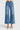 SaltTree Risen Jeans mid-rise wide-leg cropped denim with front pintuck detail in a light grey wash.