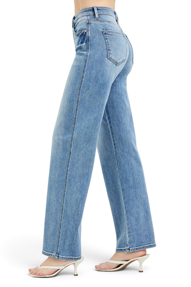 SaltTree Risen Jeans high-rise wide baggy denim in medium wash with tummy control and clean hem, side profile view.