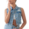 SaltTree model wearing a Wax Jean medium blue cropped boxy denim vest with destroyed detailing and button-front closure.