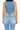 SaltTree Wax Jean medium blue cropped boxy denim vest worn by a model, back view showing structured cotton fabric.