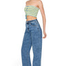 SaltTree model wearing Wax Jean dark blue snow wash mid-rise straight-leg jeans with a 30-inch inseam
