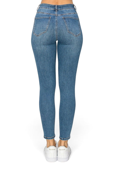 Back view of SaltTree Wax Jean high-rise skinny jeans in medium blue denim with a 27-inch inseam and five-pocket design