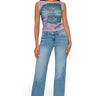 SaltTree model wearing Wax Jean medium blue low-rise fitted wide leg jeans with a 31-inch inseam and comfort stretch.