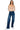 SaltTree model wearing Wax Jean mid-rise straight-leg jeans in medium blue comfort-stretch denim with subtle abrasion.